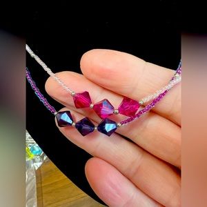 Set of 2 pink and purple necklaces